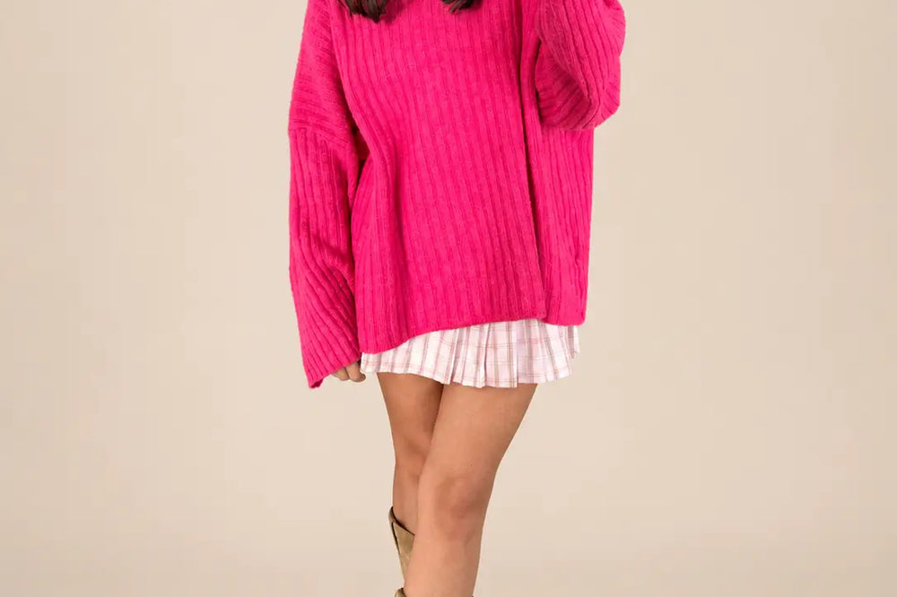 Dopamine Dressing: gerippter Strickpullover in Pink als Beispiel für Farbfreude in der Kleidung | Lisa’s Boutique