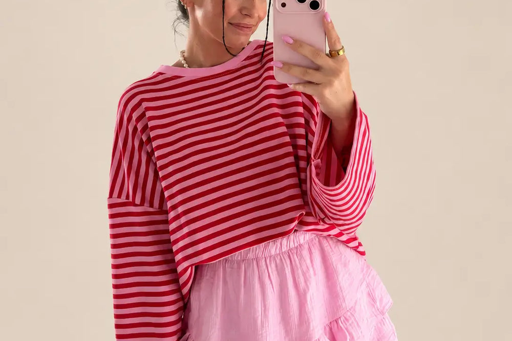 Winteroutfit mit rotem Pullover und rosa Hosenrock | Lisa’s Boutique