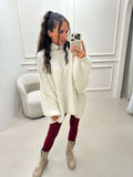 Fluffy oversized knitted sweater in cream