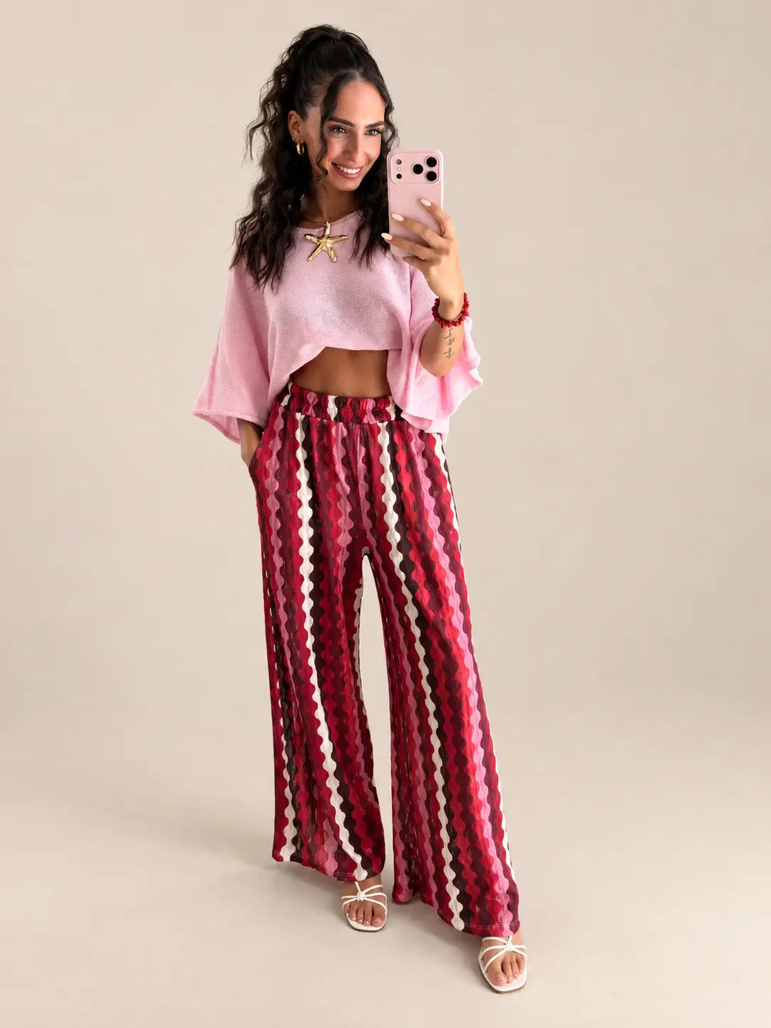 Women’s patterned trousers in Bordeaux with a rose lightweight sweater | Lisa’s Boutique