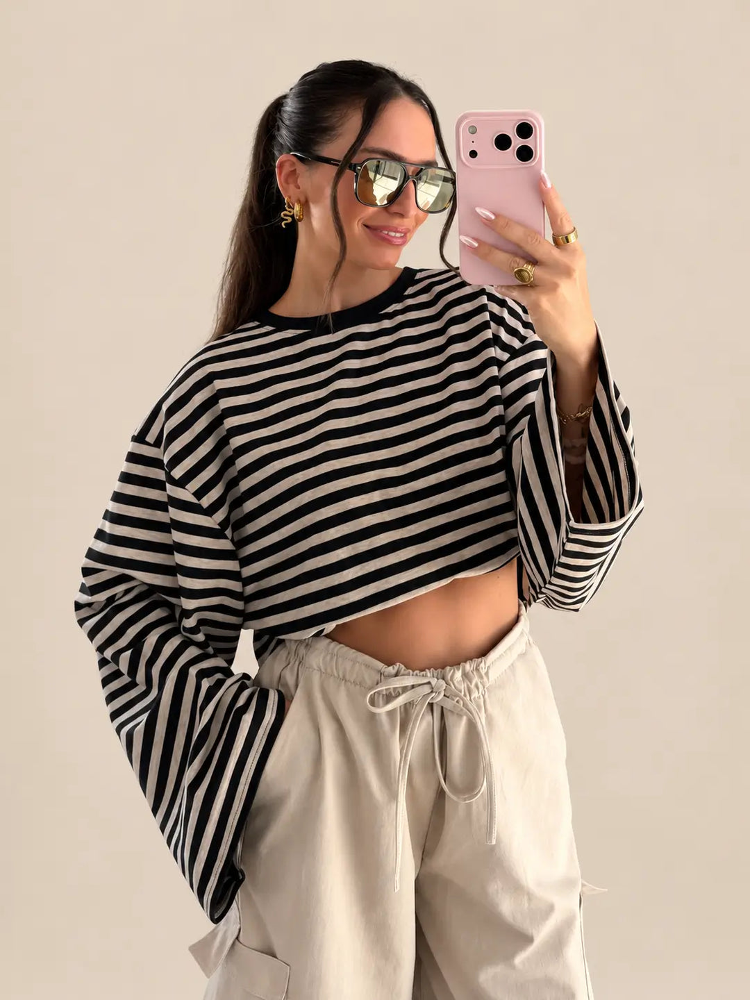 Women’s striped long sleeve top in Black with wide sleeves and a round neckline | Lisa’s Boutique
