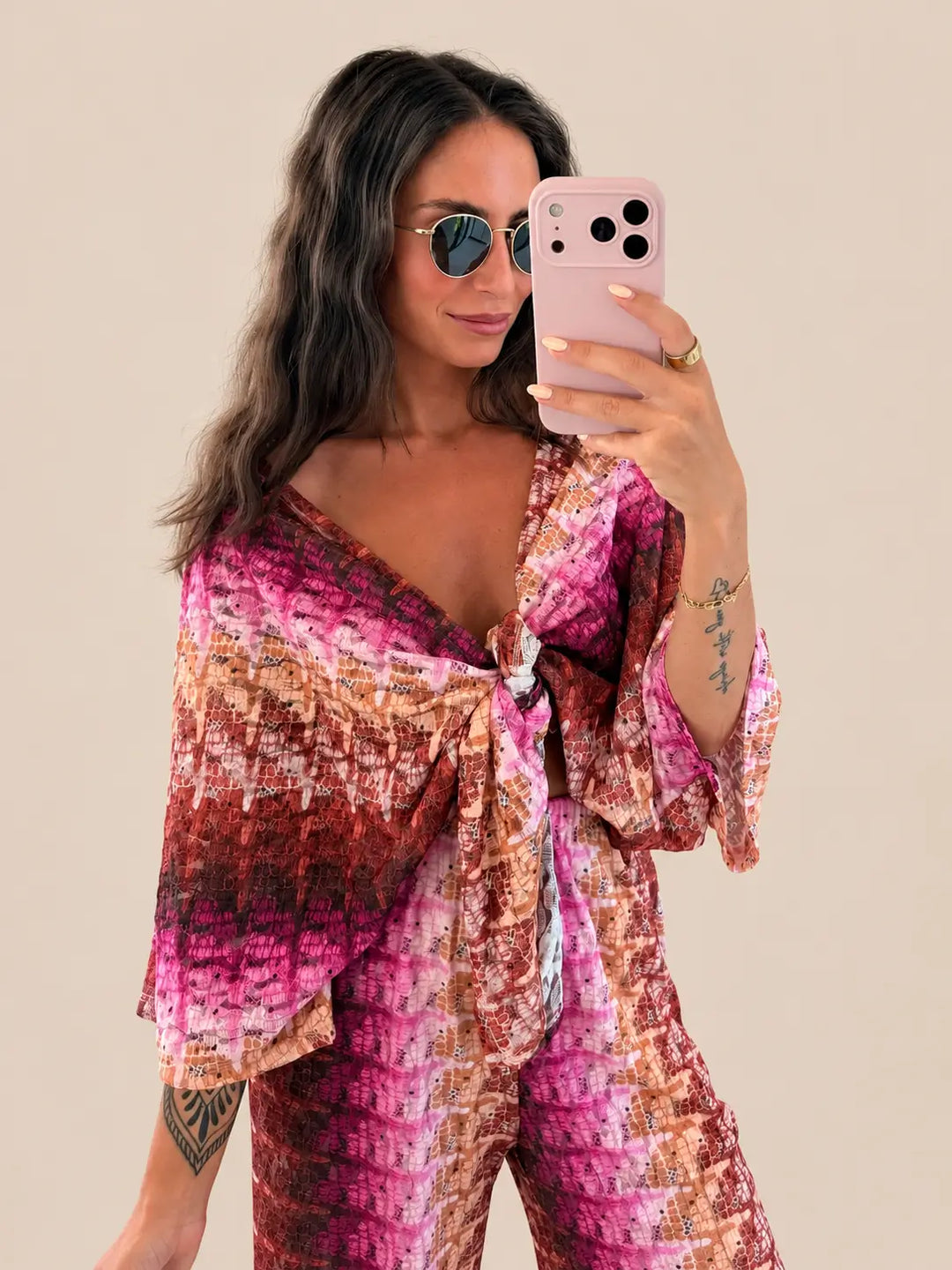 Women’s lace wrap blouse in Hot Pink with a tie detail | Lisa’s Boutique