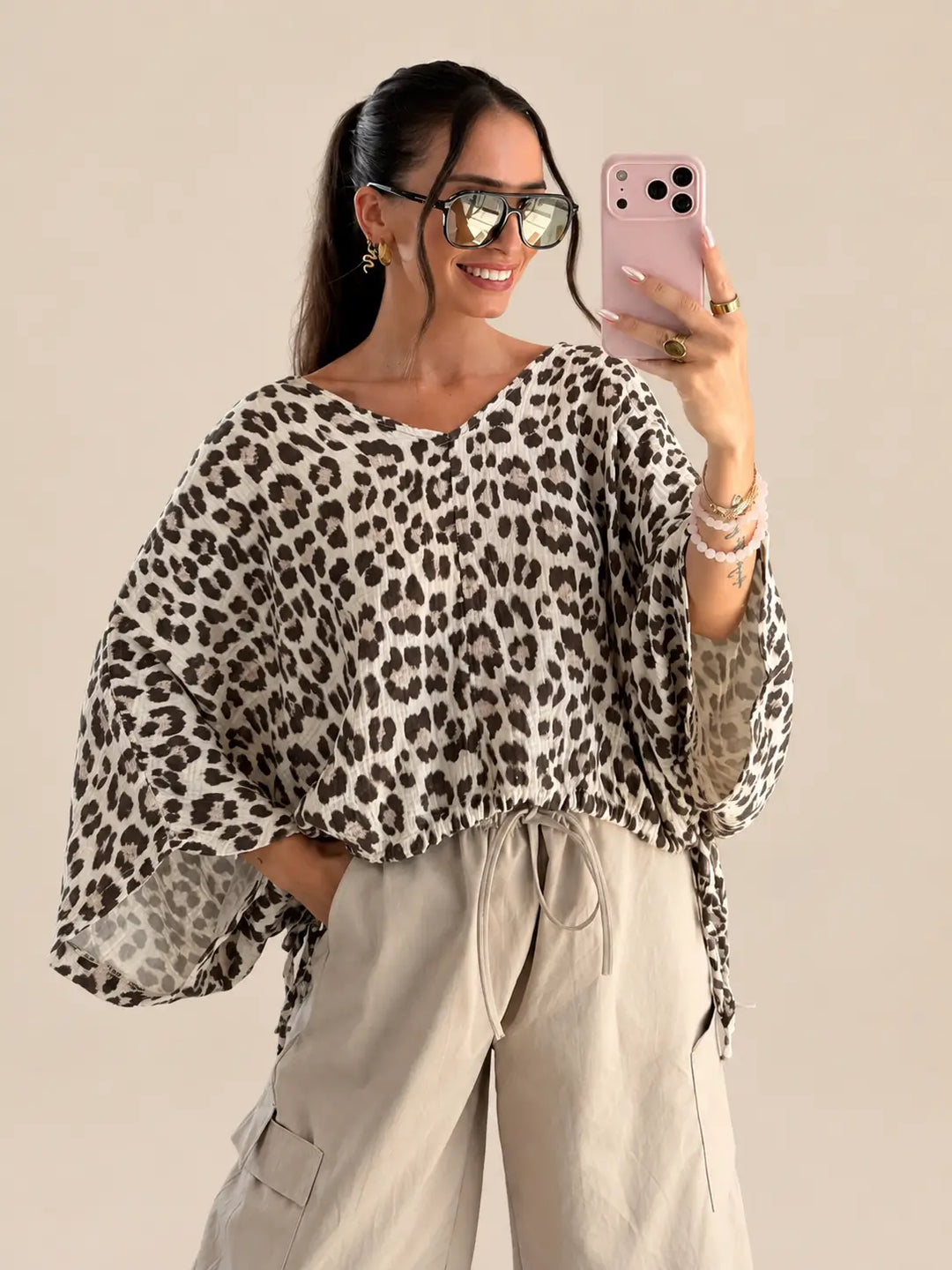 Women’s leopard muslin blouse in Beige and Brown with a V neckline and balloon sleeves | Lisa’s Boutique