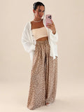 Losvallende broek met luipaardprint – Beige
