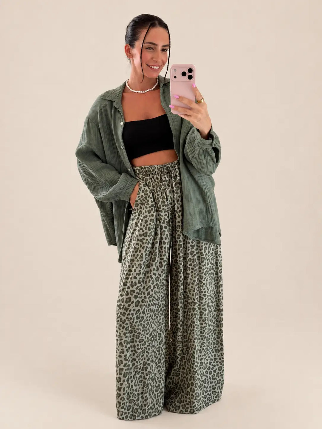 Women’s leopard print loose fitting trousers in Khaki, styled in an outfit | Lisa’s Boutique