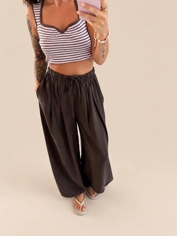 Women’s loose fitting trousers in Brown with a striped top, second view | Lisa’s Boutique