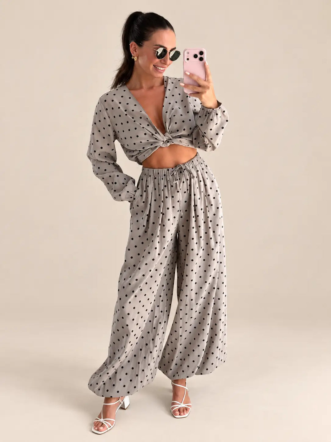 Women’s dotted outfit in Taupe with a wrap blouse and loose fitting trousers | Lisa’s Boutique
