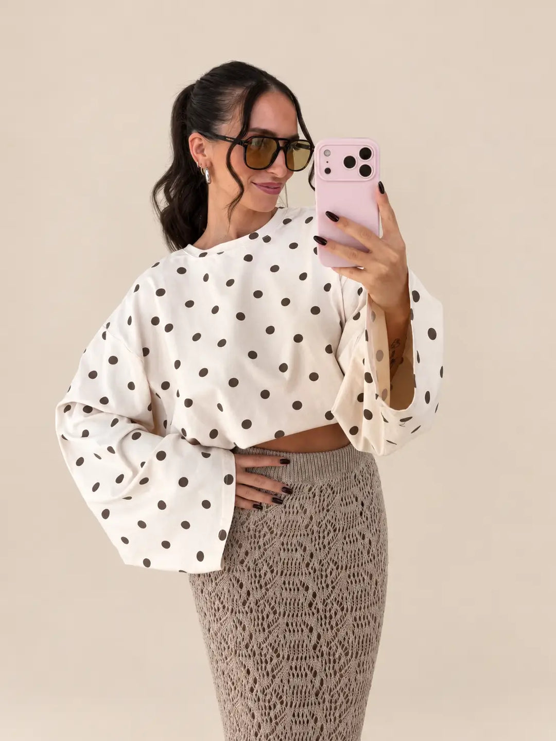 Oversized polka-dot long-sleeved top in beige