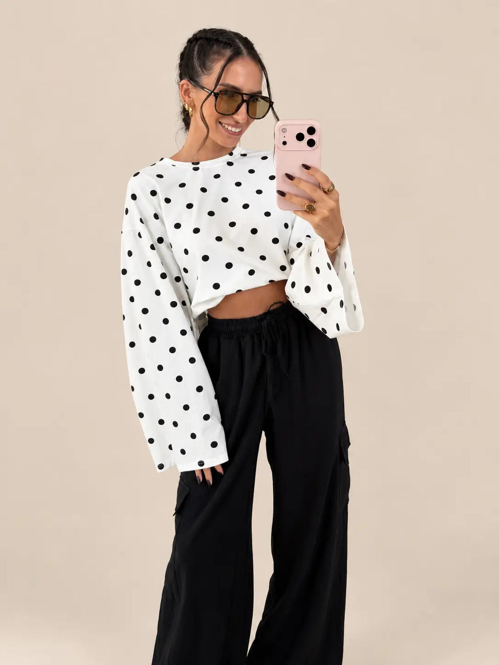 Oversize polka dot longsleeve women’s in white, full length look with black wide trousers | Lisa’s Boutique