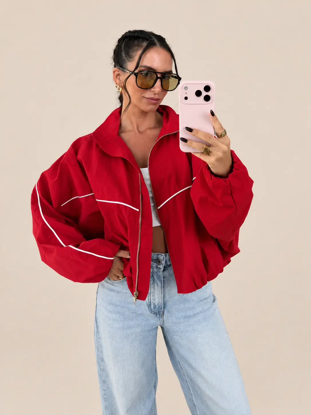 Women’s oversized blouson jacket in Red with a zip and contrast piping, front view | Lisa’s Boutique