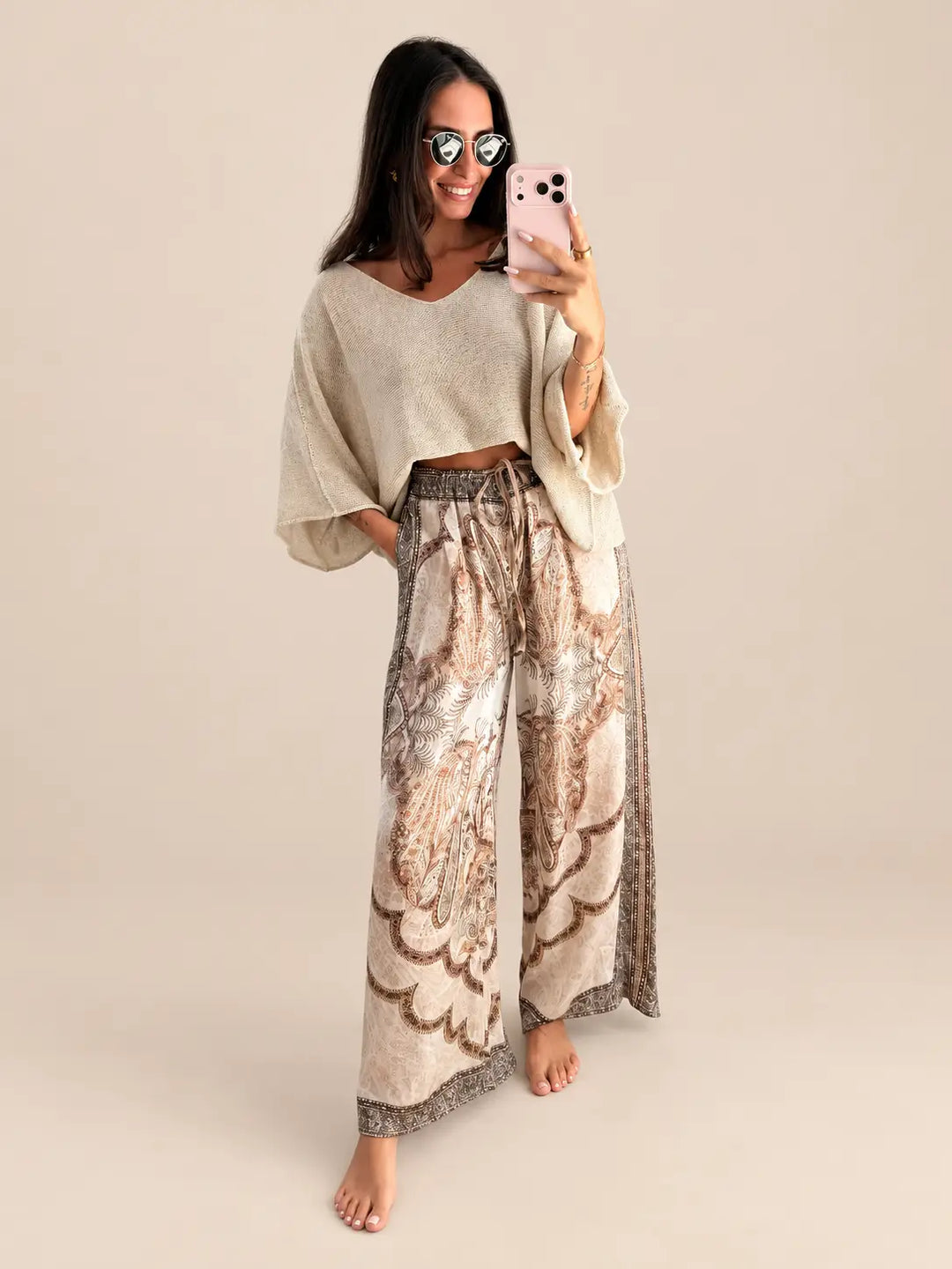 Women’s satin trousers in Beige with a paisley print and a lightweight sweater | Lisa’s Boutique