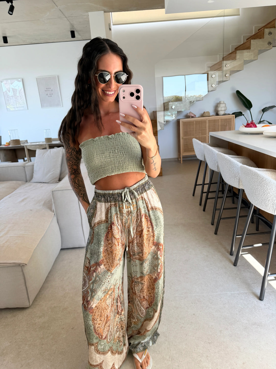 Women’s satin trousers in Khaki with a paisley print in cream and rust and an elastic drawstring waist | Lisa’s Boutique