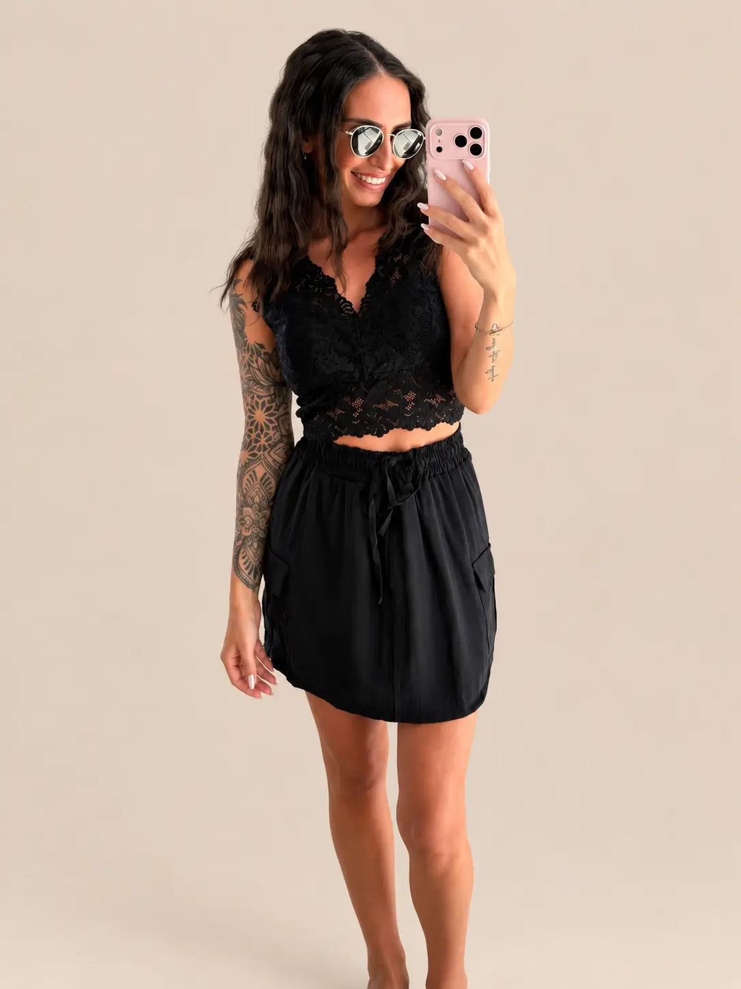 Women’s cargo skirt in Black with a tie belt and a lace bustier | Lisa’s Boutique