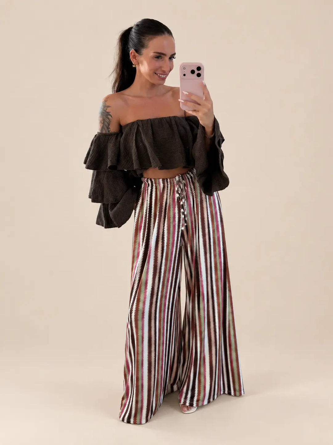 Women’s striped trousers in Brown with a tie belt and an off shoulder ruffle top | Lisa’s Boutique
