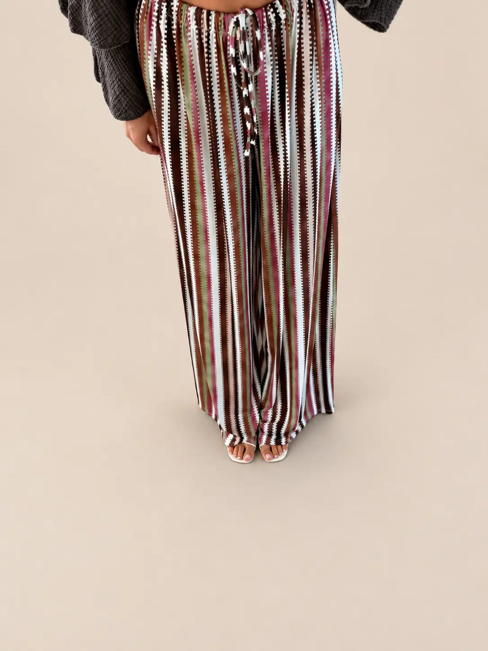 Women’s striped trousers in Brown with vertical stripes and a tie belt | Lisa’s Boutique