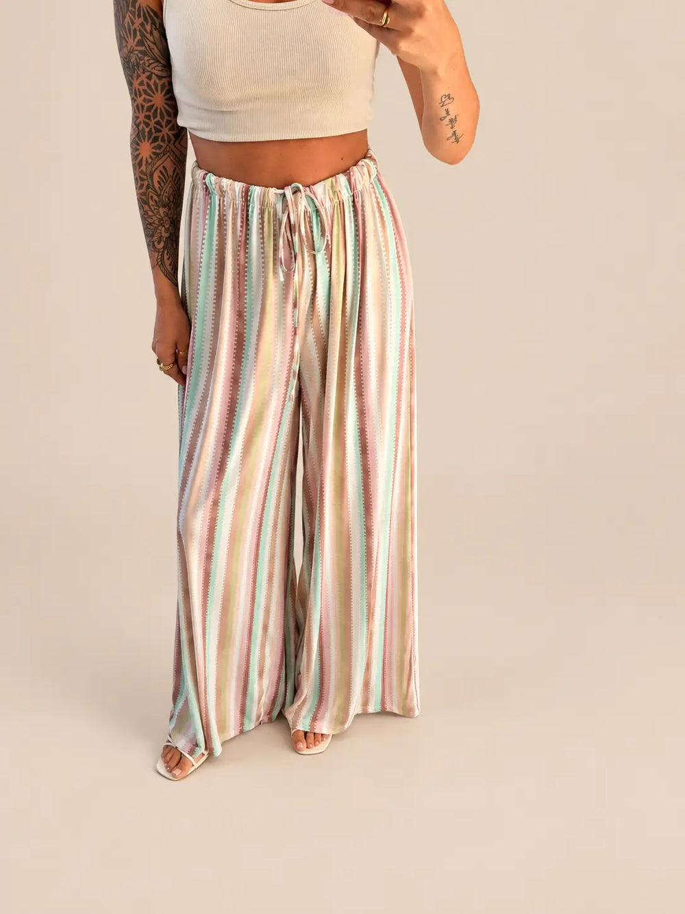 Women’s striped trousers in Multicolour, Side view | Lisa’s Boutique