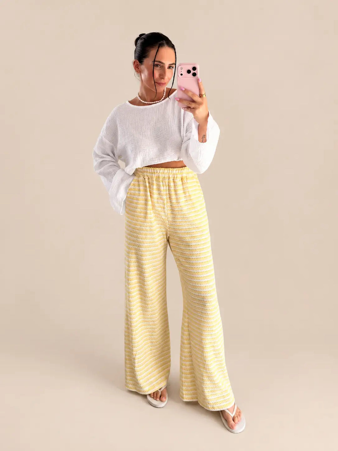 Gestreepte gebreide broek dames in geel en wit | Lisa’s Boutique