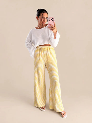 Gestreepte gebreide broek dames in geel en wit | Lisa’s Boutique