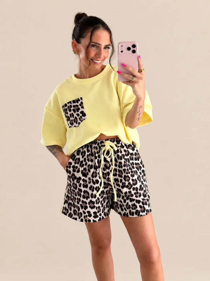 Women’s T-Shirt in Yellow with leopard print shorts, styled in an outfit | Lisa’s Boutique