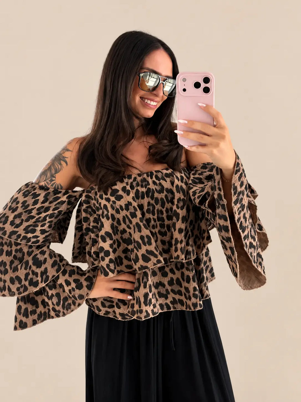 Women’s strapless muslin blouse in Leo Brown with a flounce hem and balloon sleeves | Lisa’s Boutique